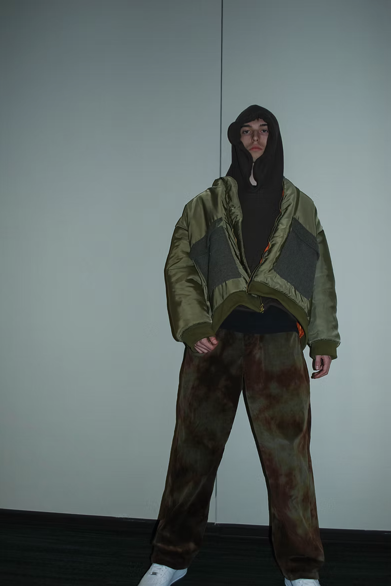 Olive bomber, hood, and washed trousers